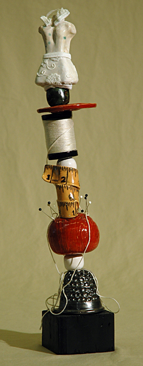 Ceramic Totem With Sewing Items